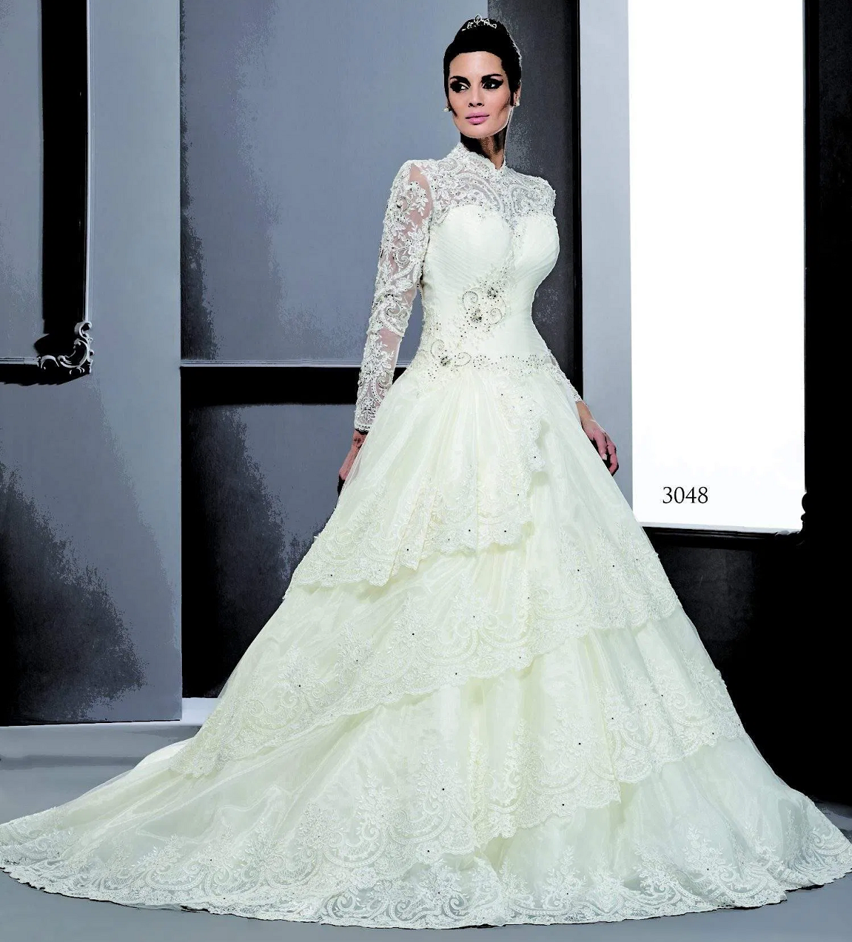 Wedding dress bling Long Sleeve Bridal Dresses in Lace Fabric Adorned with Crystals and Other beads On The Bodice