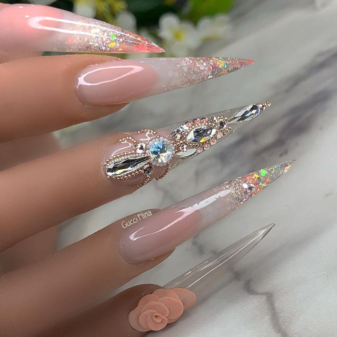 Bling fingernails Glittering Long Stiletto Tip Nails with Transparent Nail Polish and Rhinestones