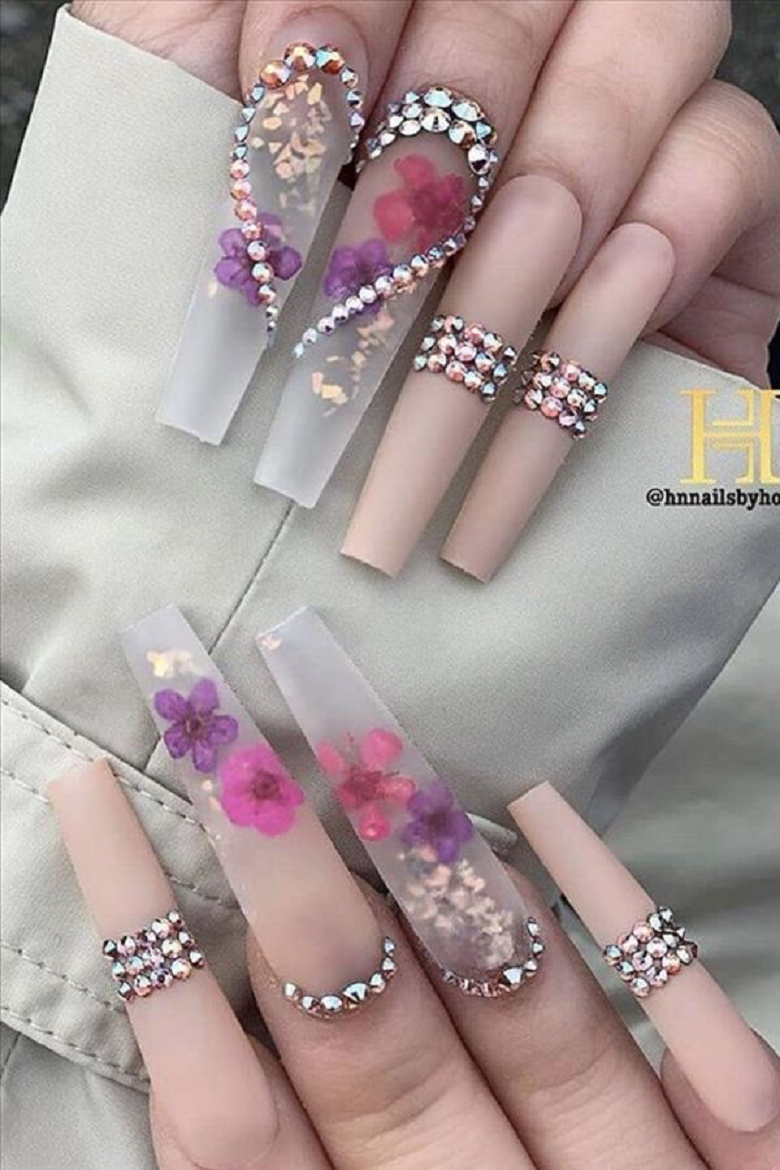 Bling fingernails Long Nails with Nude Color Nail Polish and Heart Shaped Rhinestones Design