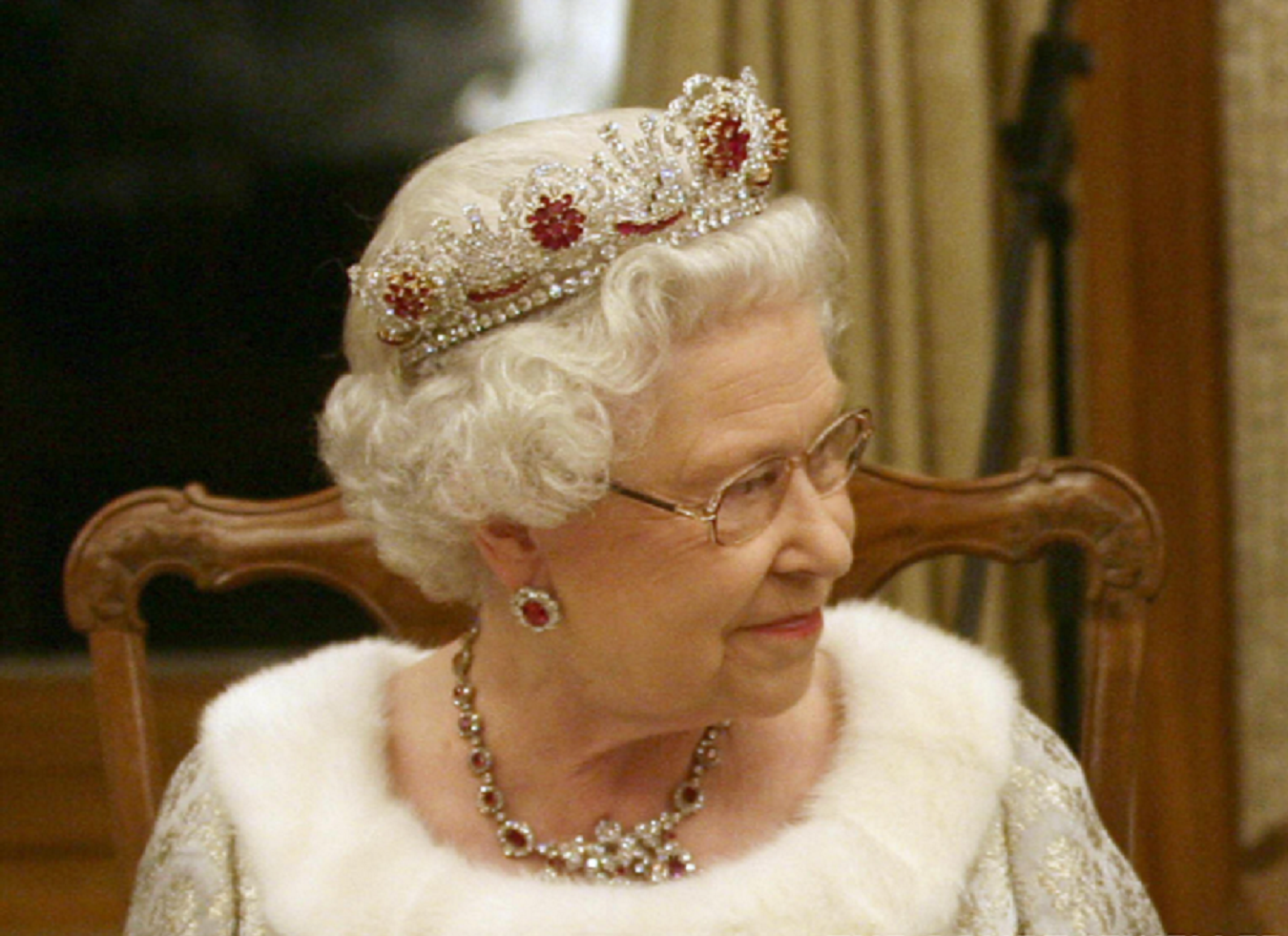 Royal bling Queen Elizabeth II wears Queen Mary's Ruby Cluster Tiara, Earrings and Necklace