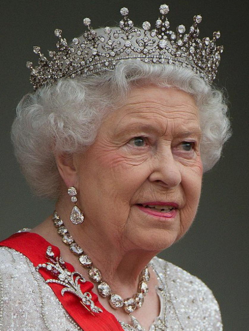 Royal bling Queen Elizabeth II At The Elysee Palace For A State Dinner with Her Majestic Crown and Matching Earrings and Necklace