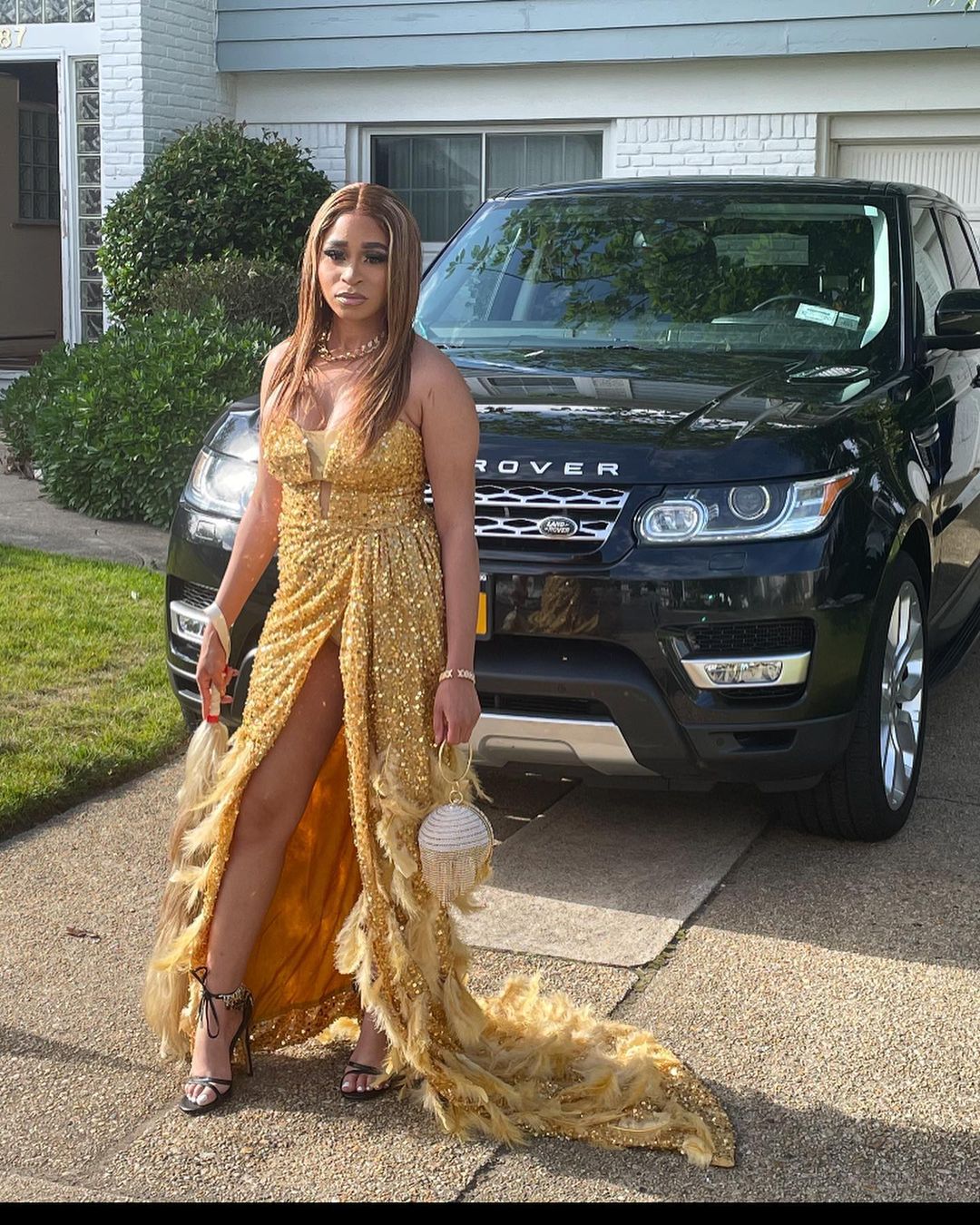 Gold Sequin OffShoulder, Sleeveless Long Prom Gown with Dress Train and High Slit