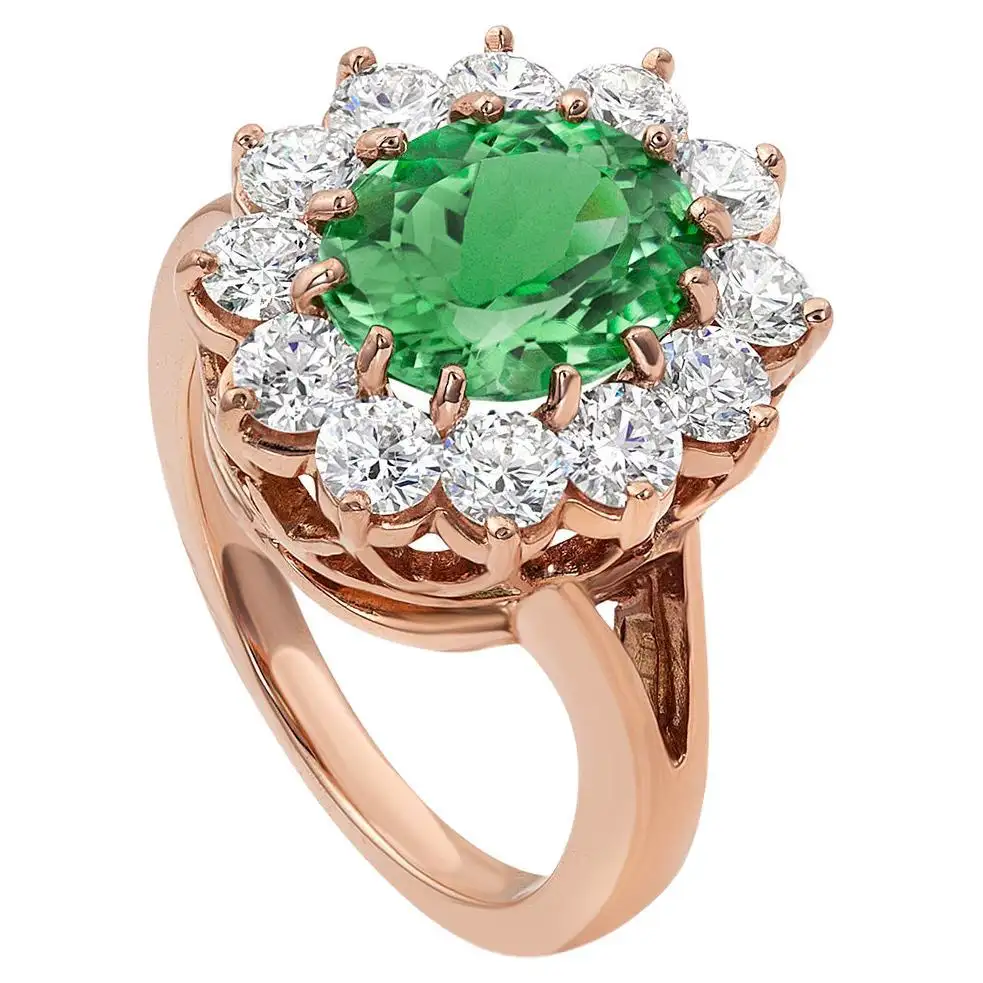 Green Emerald Cut Stone Surrounded by White Stones On Yellow Gold Ring