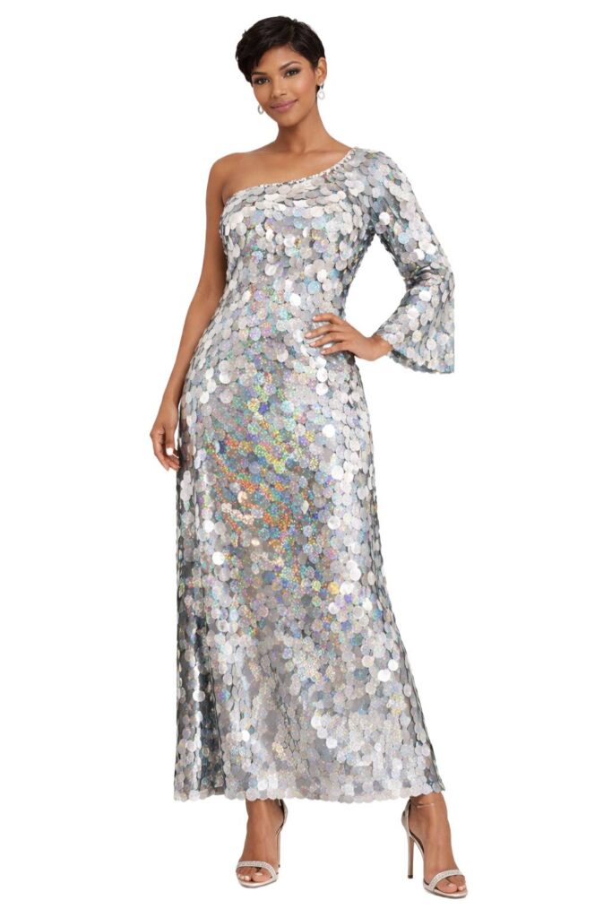 Long handmade sequin dress in hologram silver paillette sequins with silver faceted beads and a luxe grey fabric background in a one sleeve cut